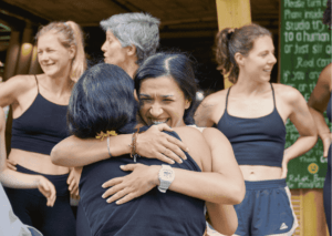 Bali YTT preparation – yoga students sharing an emotional group hug after practice